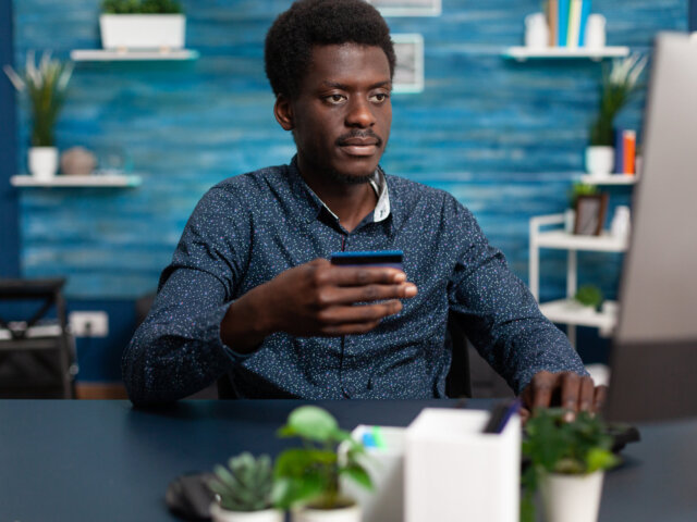 E commerce consumer shopping online with credit card