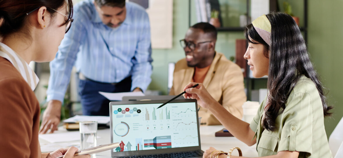 Collaborating in Modern Office with Diverse Team Members